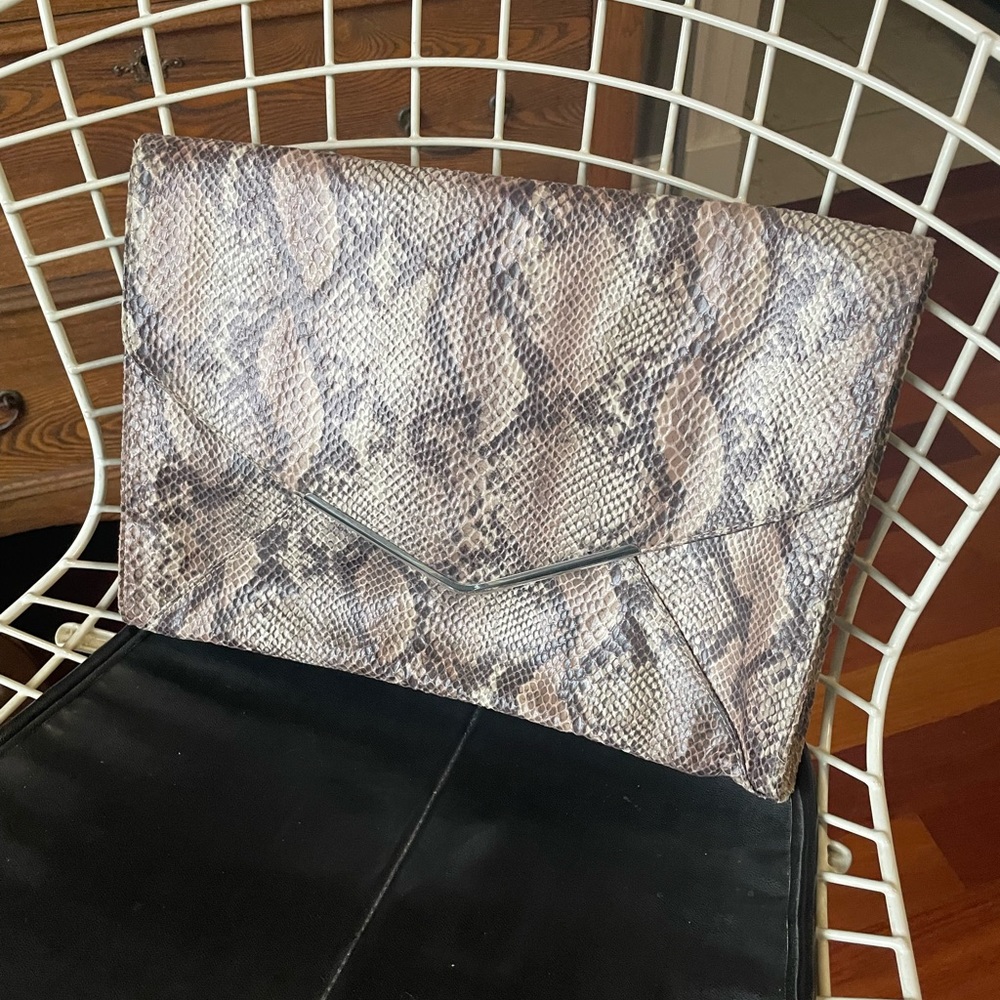 Faux snake skin purse.